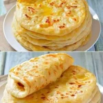 Vers gebakken Turks Brood in een schalen met diverse dips en gerechten.
