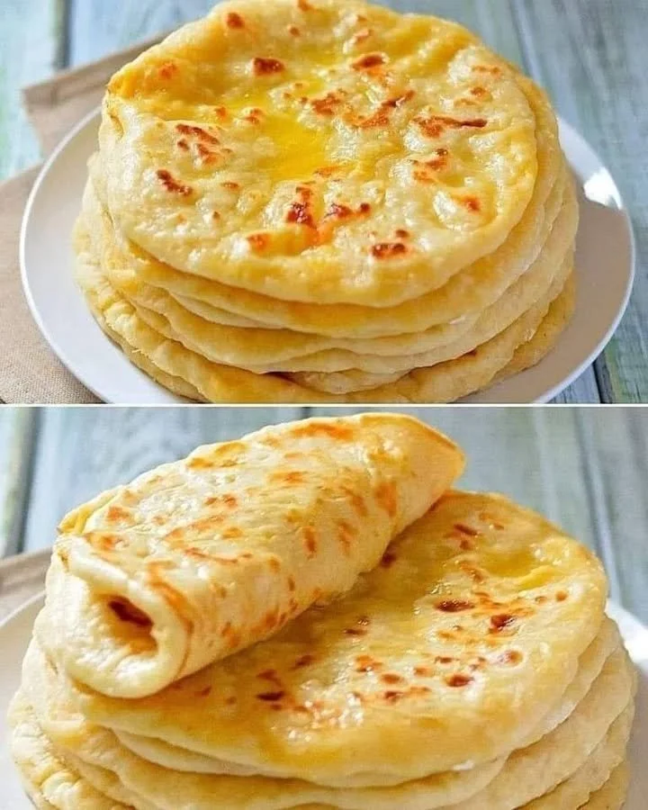 Vers gebakken Turks Brood in een schalen met diverse dips en gerechten.