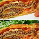 Kaasstrudel gevuld met gehakt en paprika, een smakelijke maaltijdoptie.
