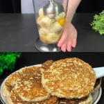 Suikervrije havermout-bananenpannenkoeken met banaan op een bord.