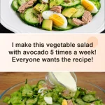Fresh avocado salad with vibrant vegetables and dressing